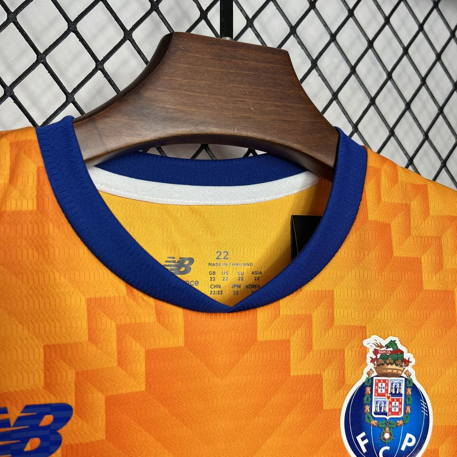 Conjunto infantil laranja alternativo 2024/25